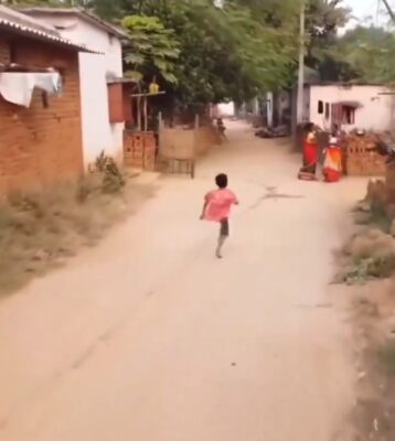 village kids seeing a drone for the first time